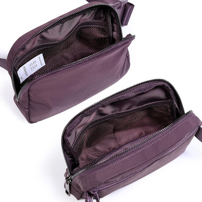 ODODOS Unisex Mini Belt Bag with Adjustable Strap Small Fanny Pack for Workout Running Traveling Hiking, Plum